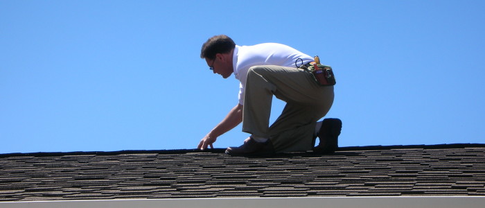 Roofing inspector in Virginia at work